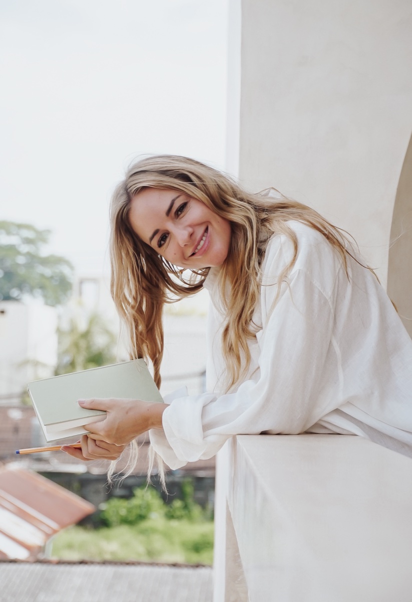 Johanna smiling with journal